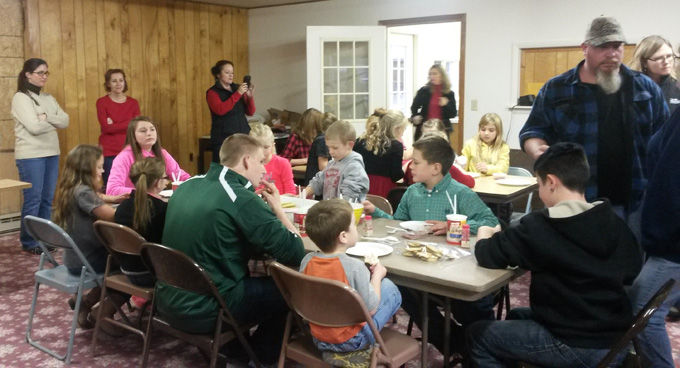 River Road Sodbusters 4-H club goes caroling